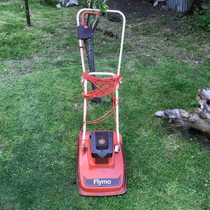 Flymo lawn mower. 1970 s 1980 s Red Bank Props